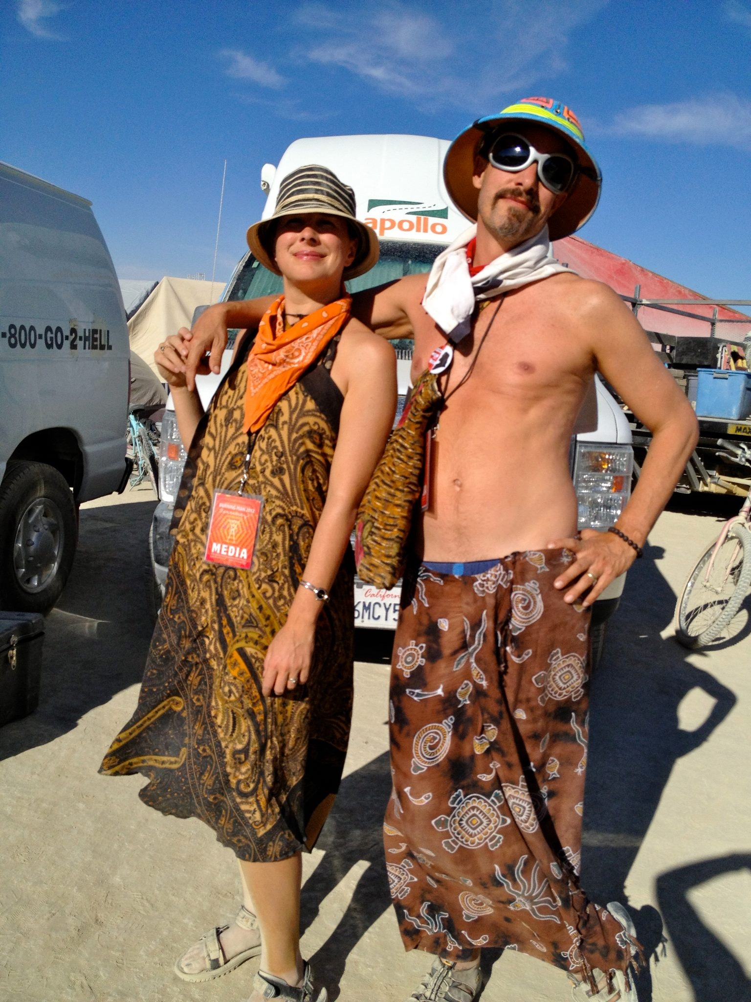 John and I posed for a photo in front of our little two-person RV, our home on the dusty playa in 2012.