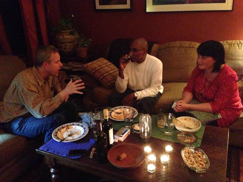 Placemats and candles make the coffee table feel less like getting exiled to the kids table.