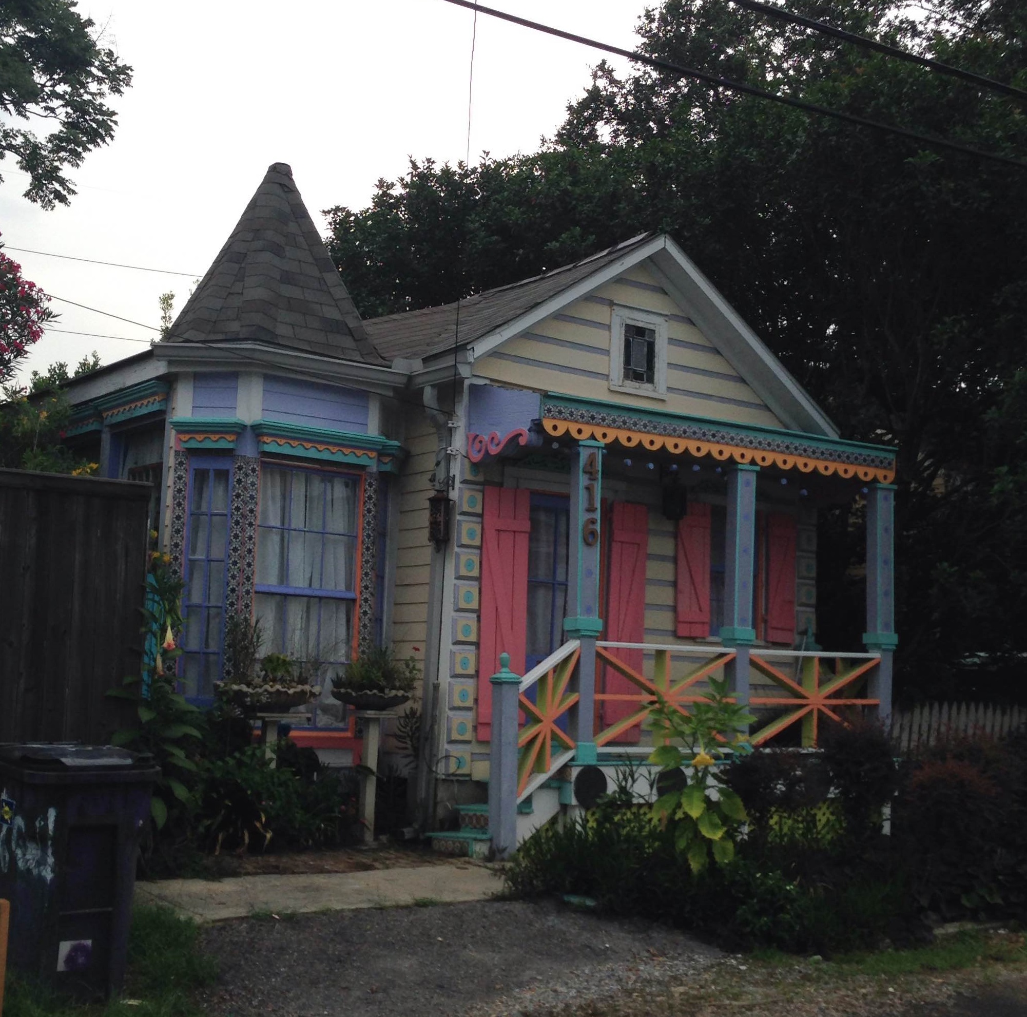 Look at all the colors making the details of this charming little house pop.